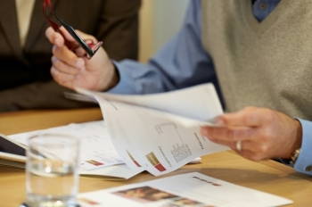 Financial Advisor going over paperwork with client